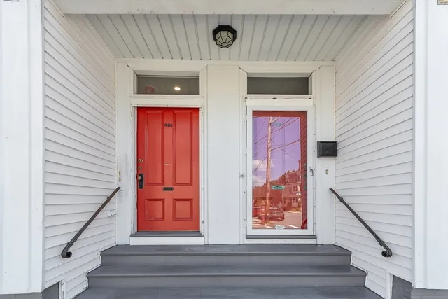 a view of front door of stairs
