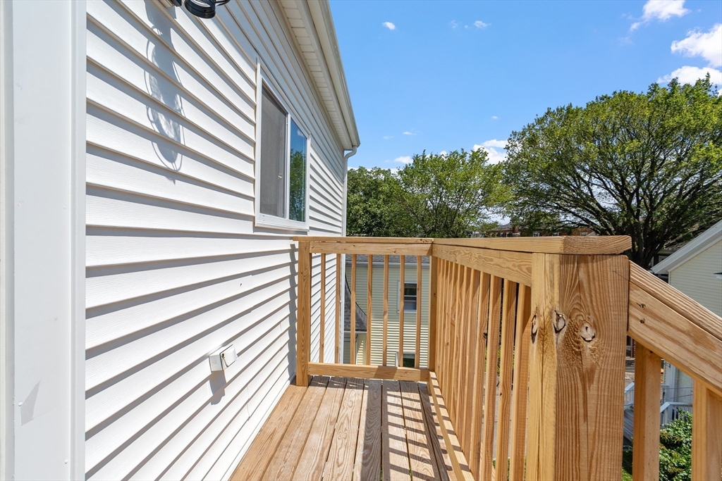 67 Essex Street, Unit 2 Salem, MA 01970 - Photo 29 of 35 a view of a wooden fence
