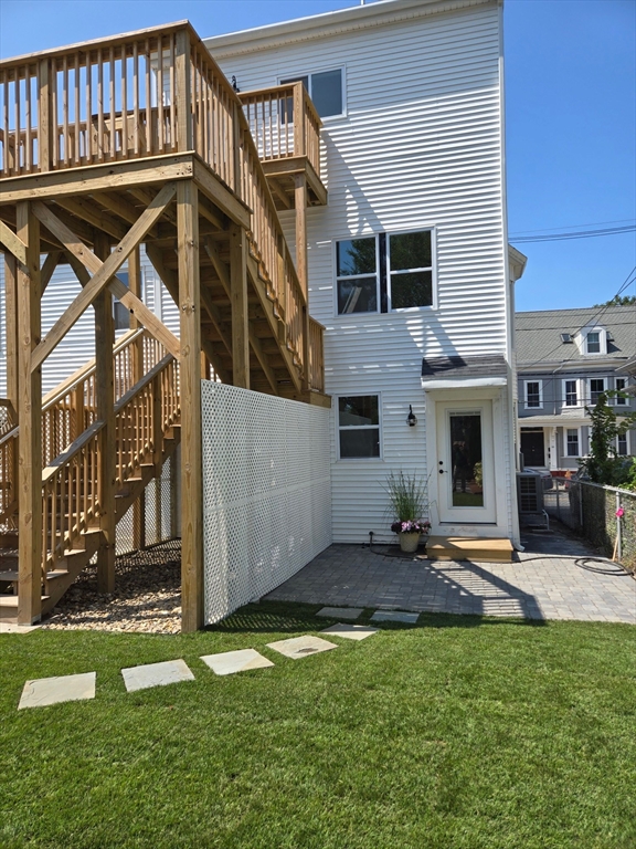 67 Essex Street, Unit 2 Salem, MA 01970 - Photo 35 of 35 a view of a house with backyard and sitting area