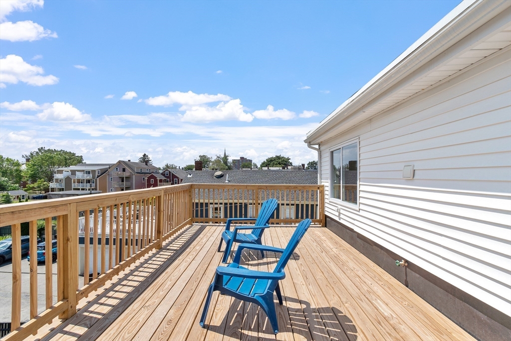 67 Essex Street, Unit 2 Salem, MA 01970 - Photo 4 of 35 a view of a balcony with chairs
