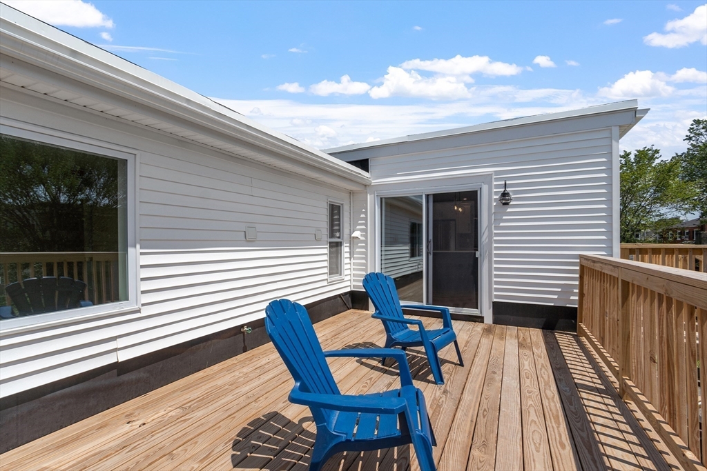 67 Essex Street, Unit 2 Salem, MA 01970 - Photo 6 of 35 a view of a two chairs in the deck