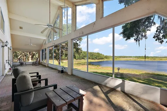 a view of a living room and dining room