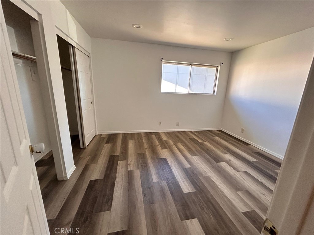 427 East Park Avenue, Unit 2 Santa Maria, CA 93454 - Photo 10 of 12 a view of a hardwood floor in a room