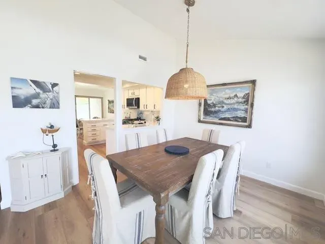 a view of a dining room with furniture