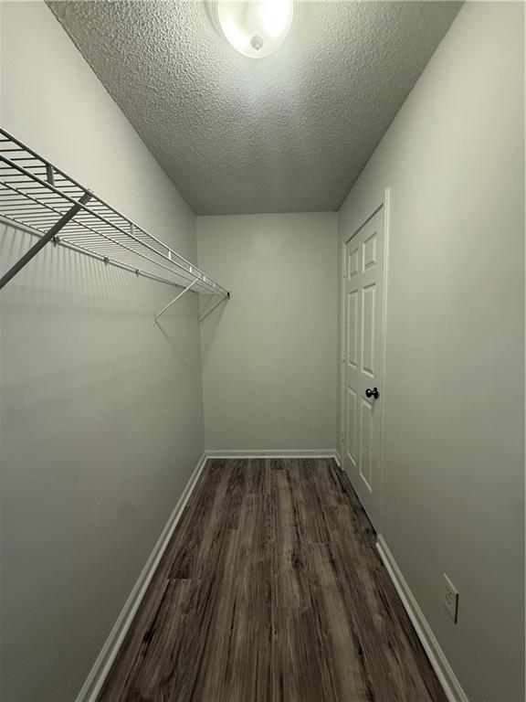 2540 Fortune Drive Dacula, GA 30019 - Photo 18 of 54 a view of a room with wooden floor and white walls