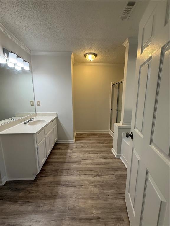 2540 Fortune Drive Dacula, GA 30019 - Photo 27 of 54 a bathroom with a double vanity sink and mirror