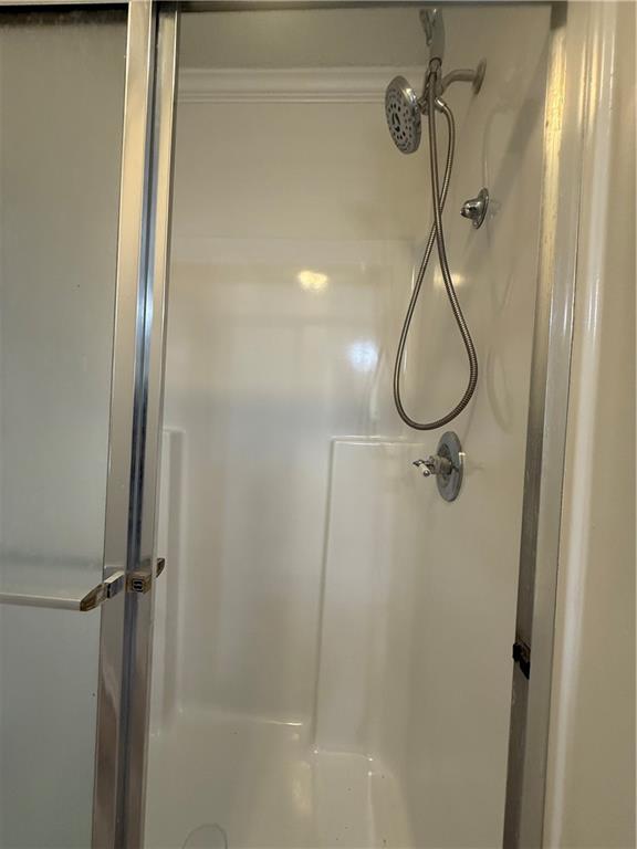 2540 Fortune Drive Dacula, GA 30019 - Photo 34 of 54 a bathroom with a shower