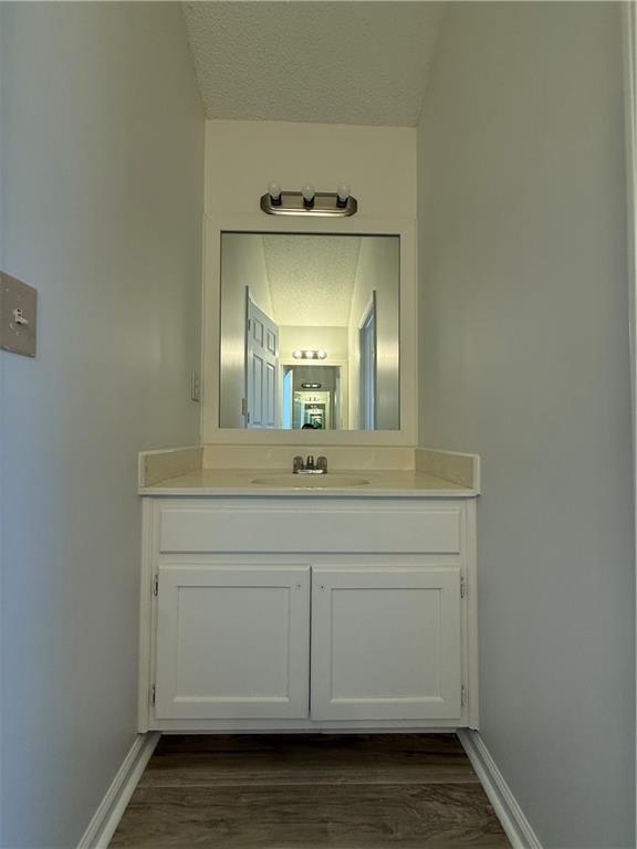 2540 Fortune Drive Dacula, GA 30019 - Photo 37 of 54 a bathroom with a sink and a mirror