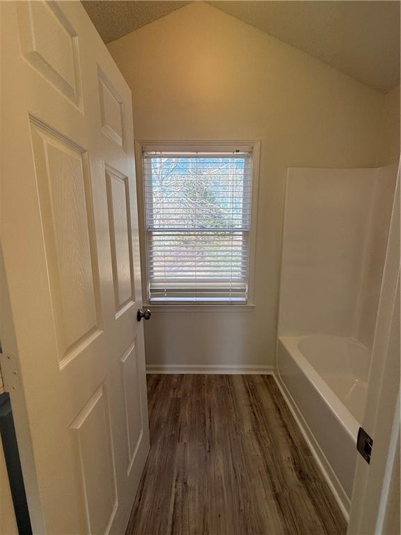 2540 Fortune Drive Dacula, GA 30019 - Photo 38 of 54 a view of a room with wooden floor and windows