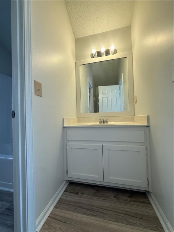 2540 Fortune Drive Dacula, GA 30019 - Photo 39 of 54 a bathroom with a sink and a mirror