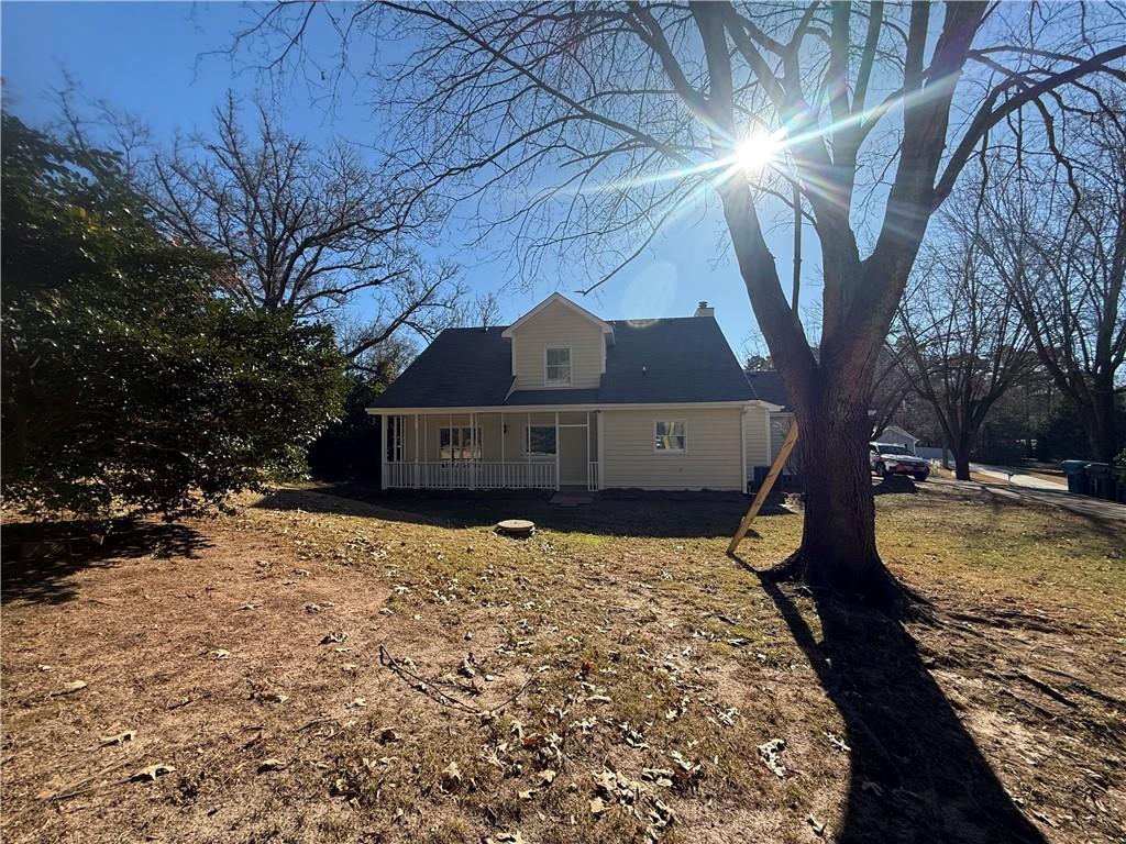2540 Fortune Drive Dacula, GA 30019 - Photo 47 of 54 a view of a large tree in front of a house