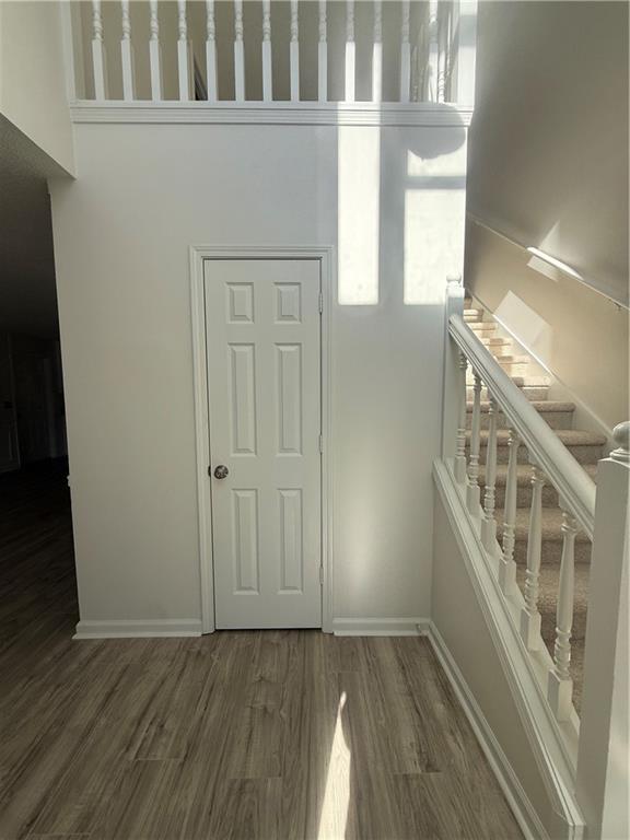 2540 Fortune Drive Dacula, GA 30019 - Photo 6 of 54 a view of an entryway with wooden floor