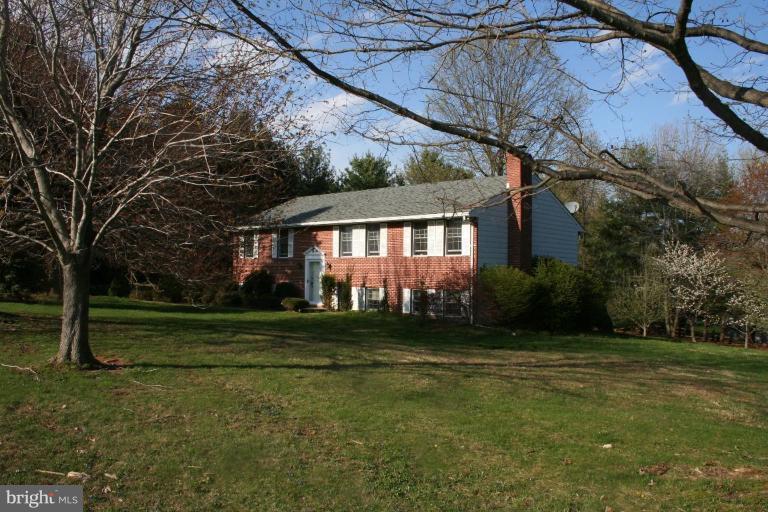 6620 Lewis Road Baldwin, MD 21013 - Photo 14 of 15 a front view of a house with a yard