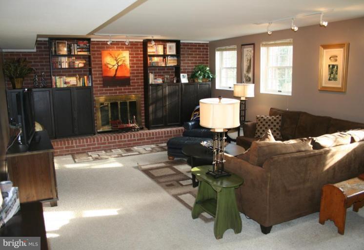 6620 Lewis Road Baldwin, MD 21013 - Photo 7 of 15 a living room with furniture and a floor to ceiling window