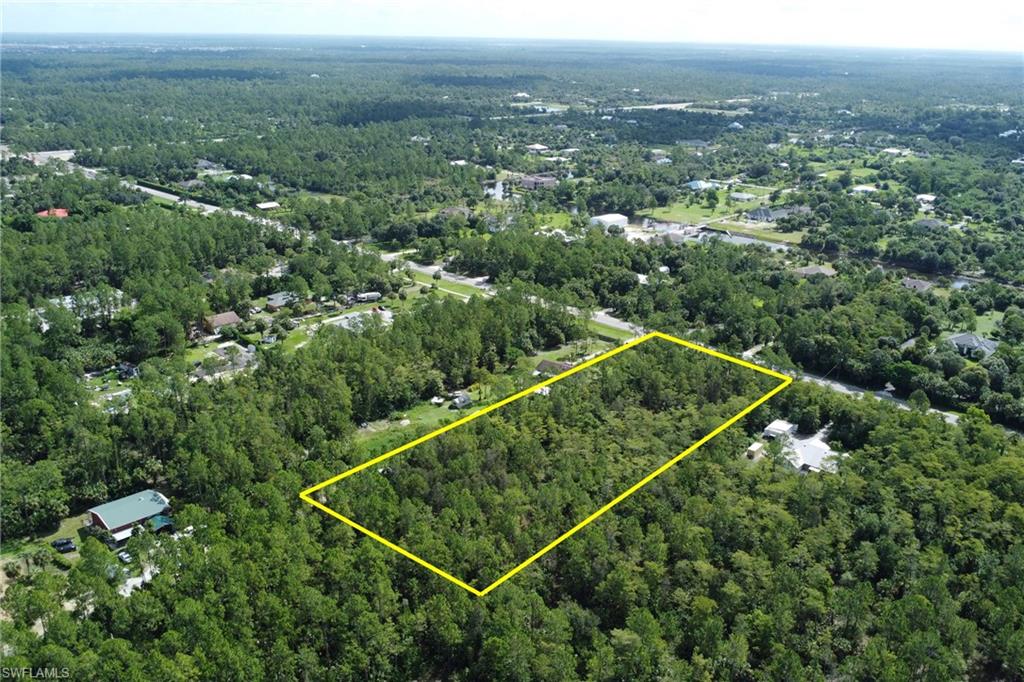 8th Street Northeast Naples, FL 34102 - Photo 8 of 10 Aerial overview of property's location with a heavily wooded area and property parcel outlined
