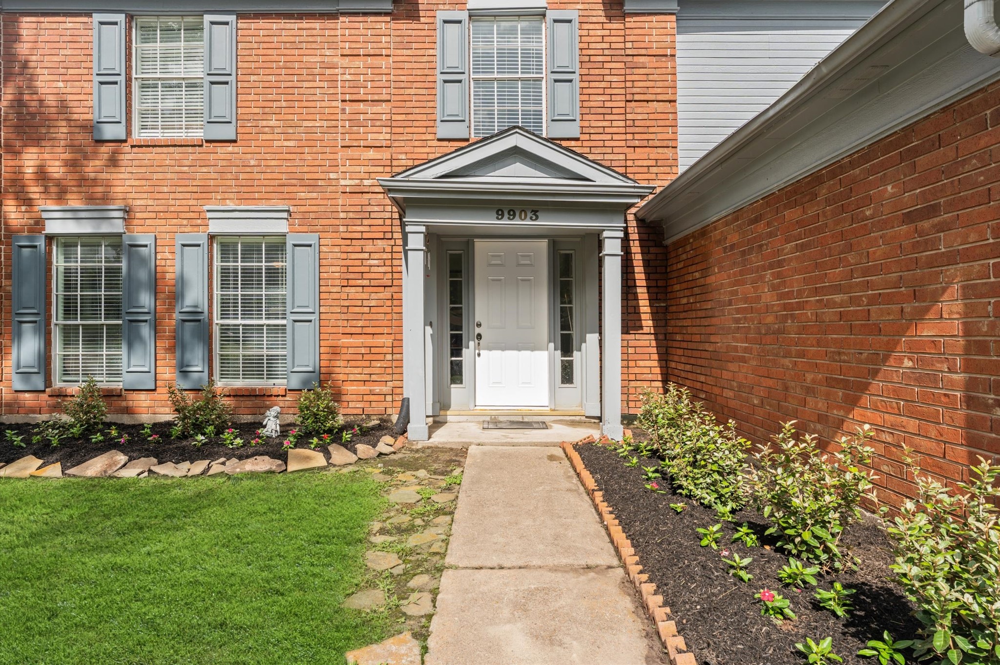 9903 Burntfork Street Houston, TX 77064 - Photo 3 of 25 Brand new front door and landscaping welcomes you home!