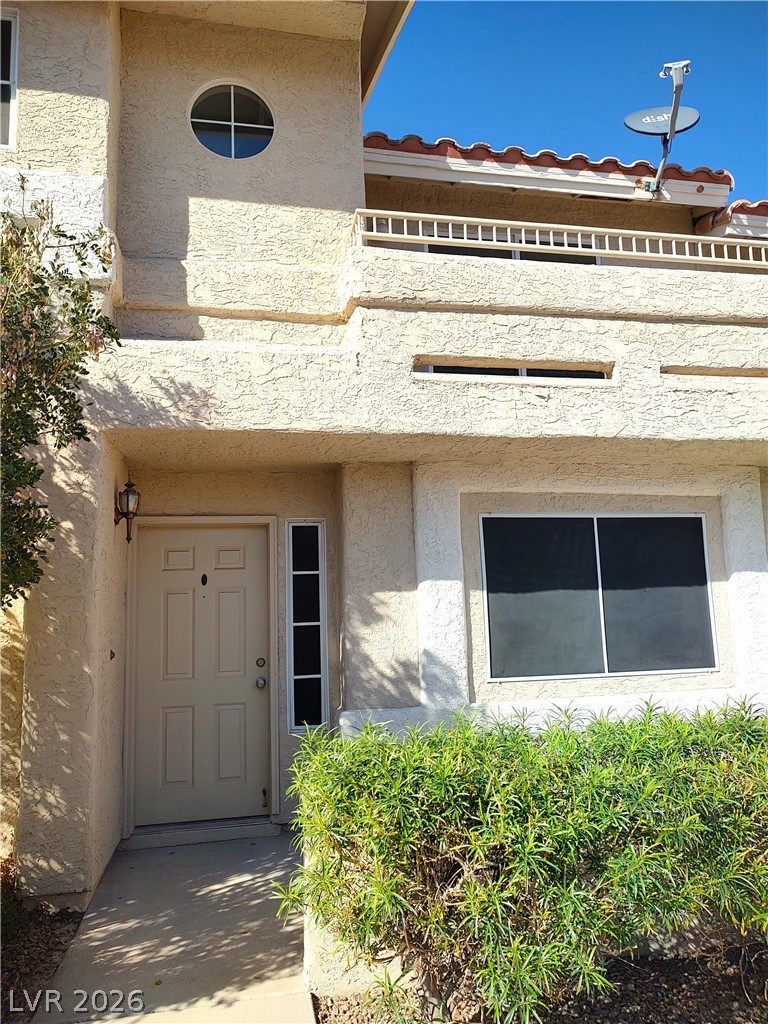 2223 Rugged Mesa Drive Laughlin, NV 89029 - Photo 3 of 39 Entrance to property featuring stucco siding