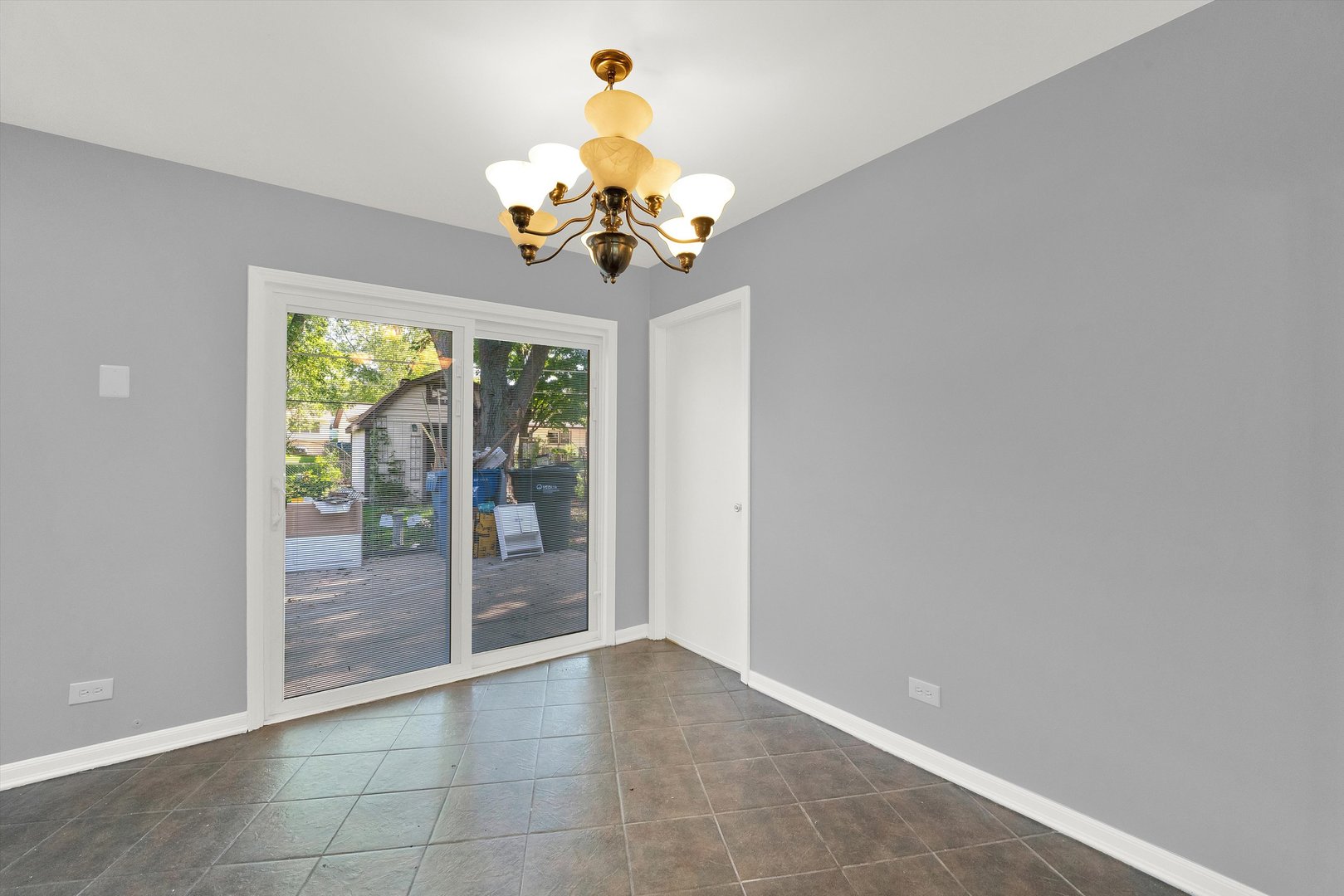 7133 Edgebrook Lane Hanover Park, IL 60133 - Photo 11 of 26 a view of a chandelier in a room