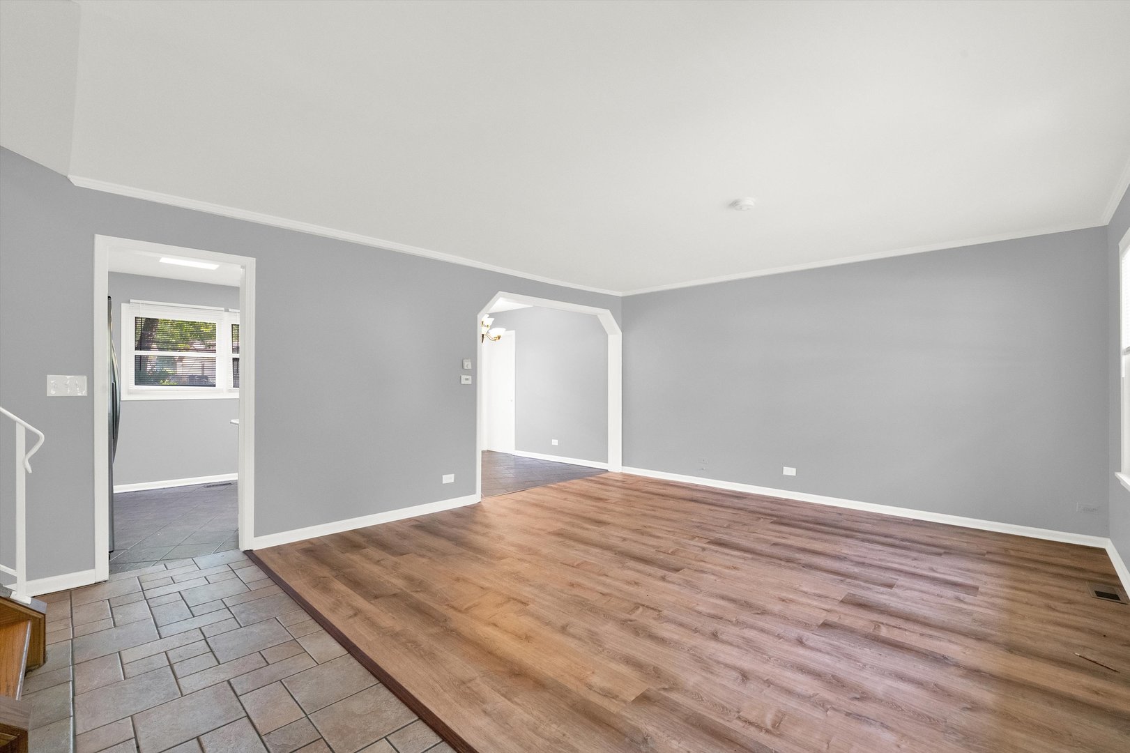 7133 Edgebrook Lane Hanover Park, IL 60133 - Photo 12 of 26 a view of an empty room with wooden floor