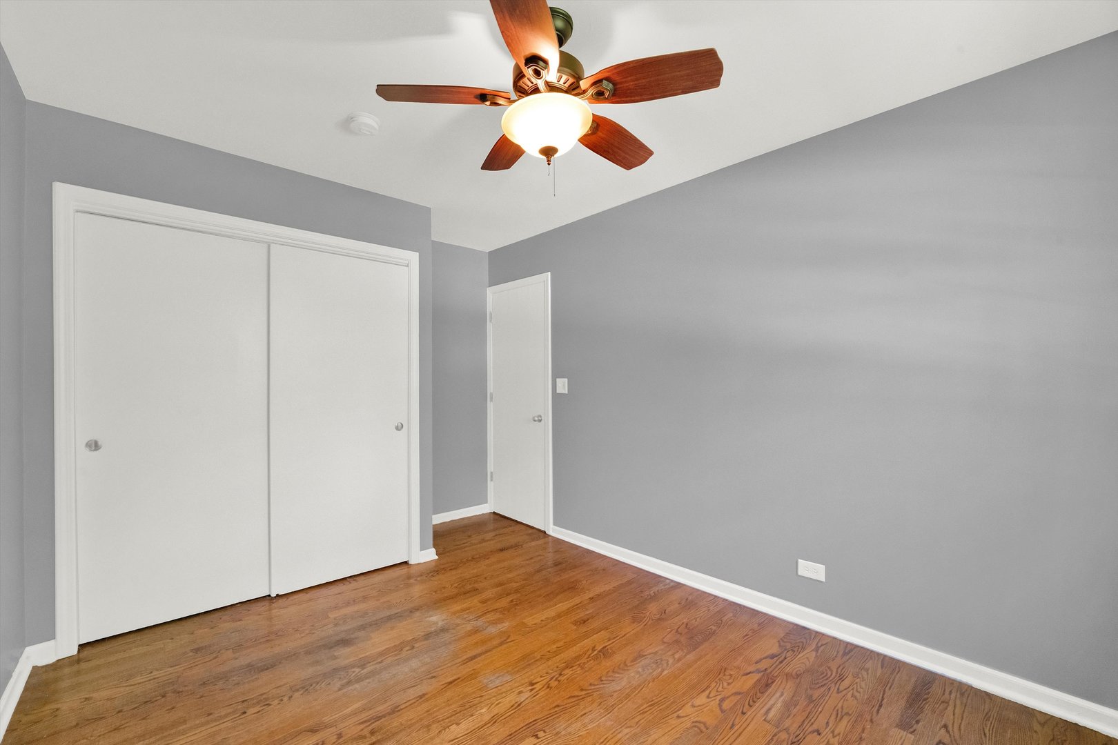 7133 Edgebrook Lane Hanover Park, IL 60133 - Photo 16 of 26 wooden floor in an empty room
