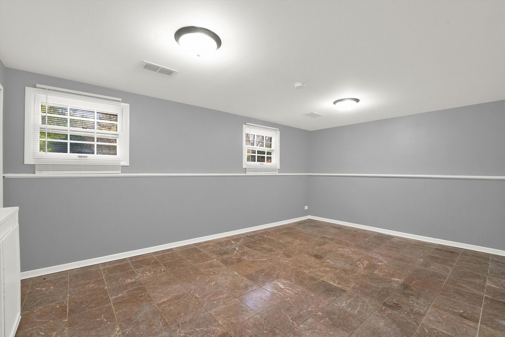 7133 Edgebrook Lane Hanover Park, IL 60133 - Photo 23 of 26 an empty room with windows