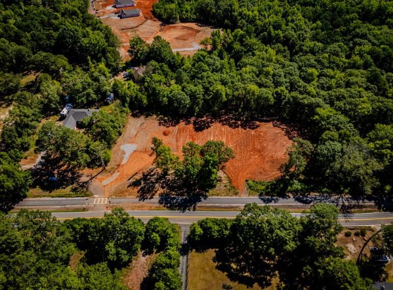 174 Mountain View Court Hamilton, GA 31811 - Photo 1 of 2 a view of a yard with plants and large trees