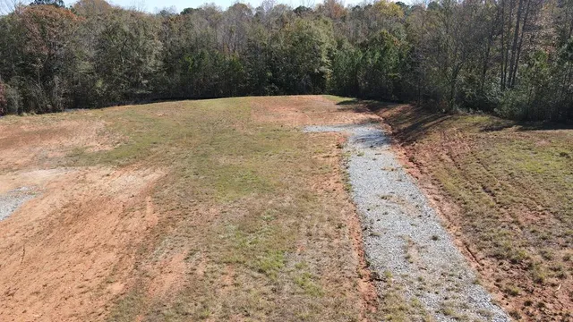 a view of a backyard of the house