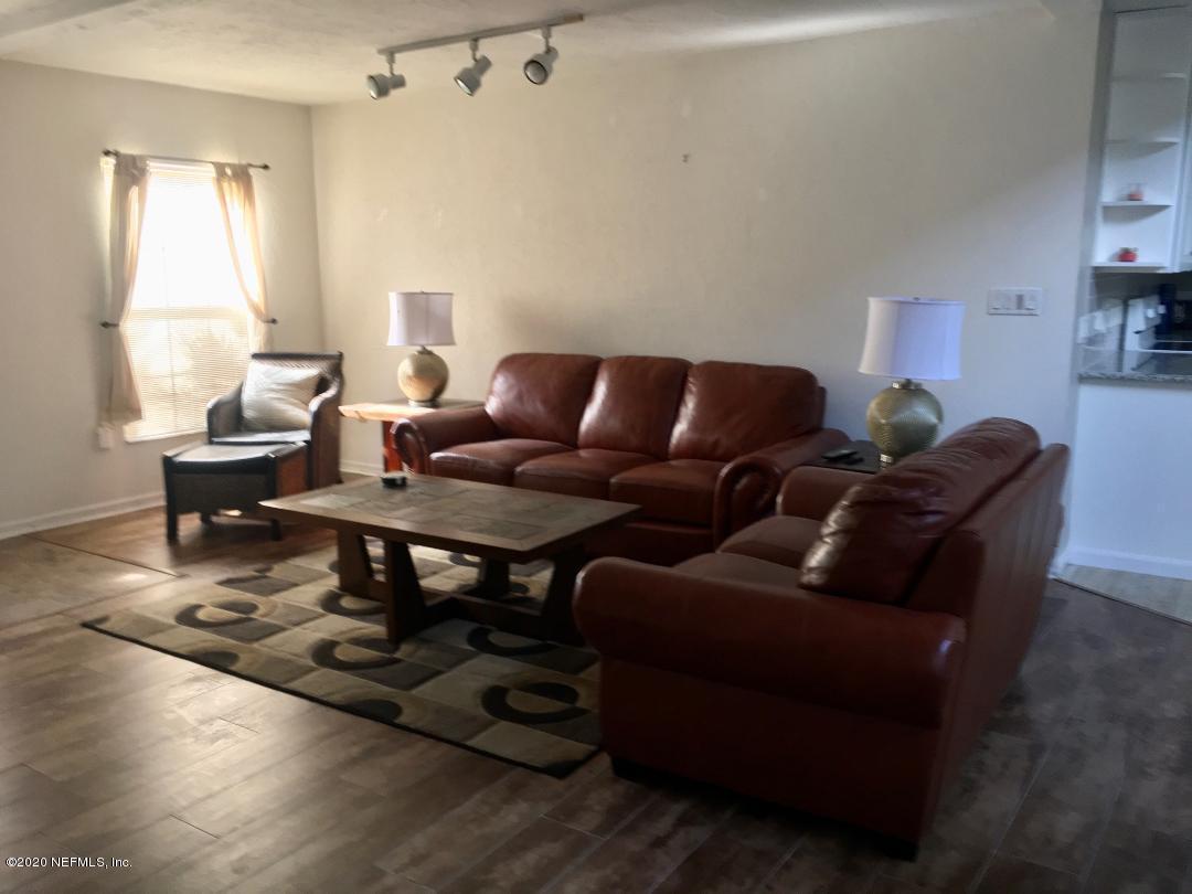 22 Bermuda Run Way St. Augustine, FL 32080 - Photo 13 of 30 a living room with furniture a rug and a window
