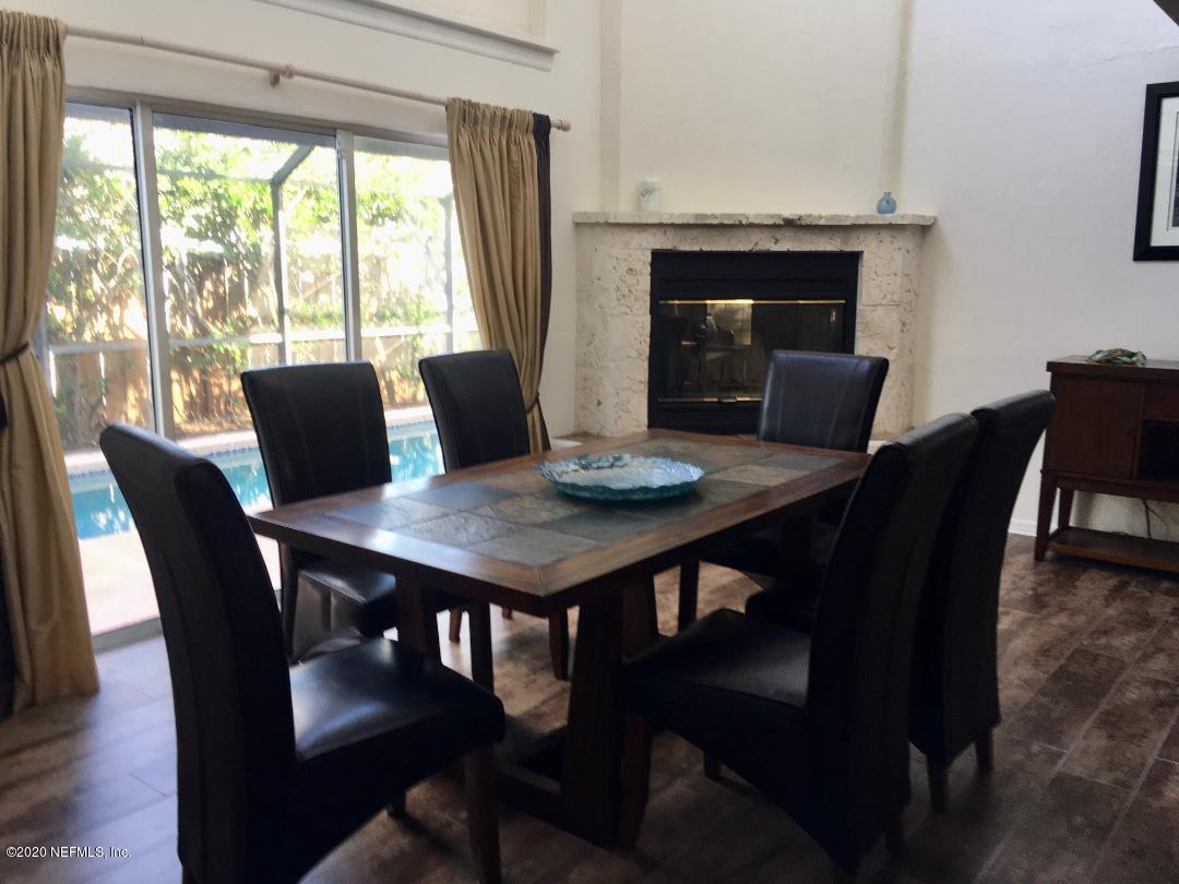 22 Bermuda Run Way St. Augustine, FL 32080 - Photo 14 of 30 a view of a dining room with furniture window and wooden floor