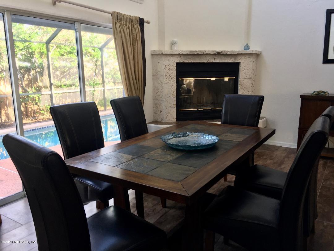 22 Bermuda Run Way St. Augustine, FL 32080 - Photo 15 of 30 a view of a dining room with furniture window and outside view