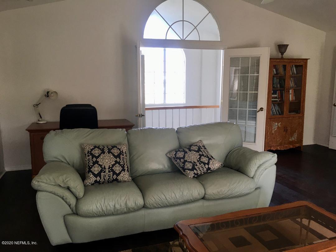 22 Bermuda Run Way St. Augustine, FL 32080 - Photo 22 of 30 a living room with furniture and a large window