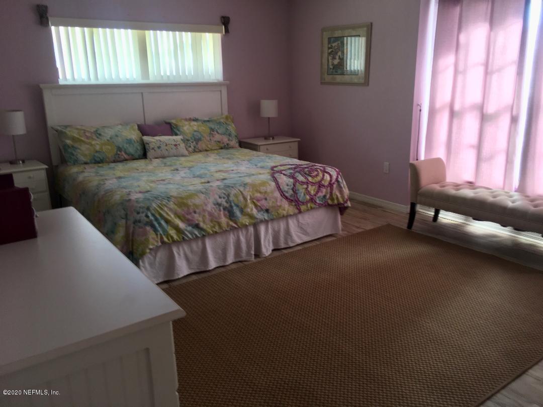 22 Bermuda Run Way St. Augustine, FL 32080 - Photo 28 of 30 a bedroom with a bed and a window