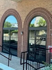 a view of hall way with furniture