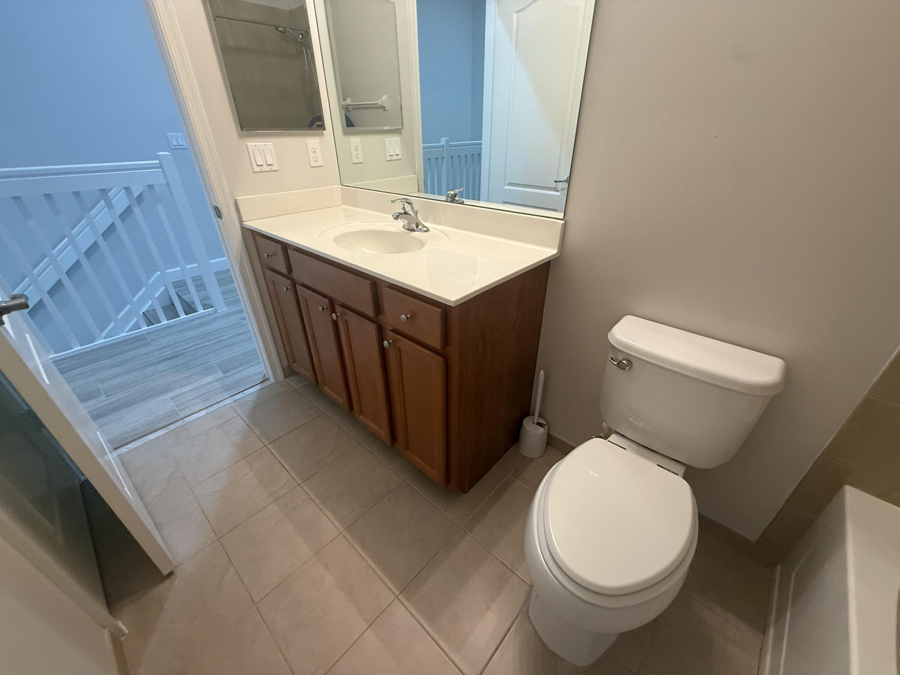 9519 Southwest Merlin Court Stuart, FL 34997 - Photo 19 of 26 Guest Bath