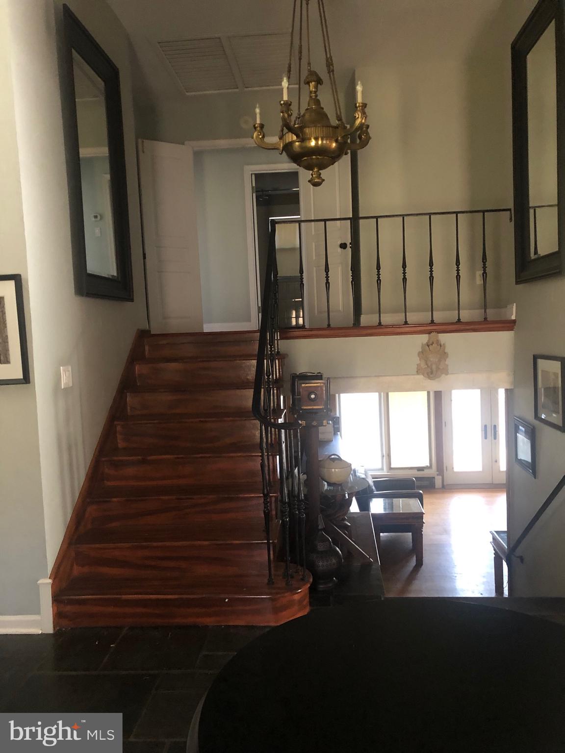 351 Hidden River Road Penn Valley, PA 19072 - Photo 5 of 48 a view of entryway and hall with wooden floor