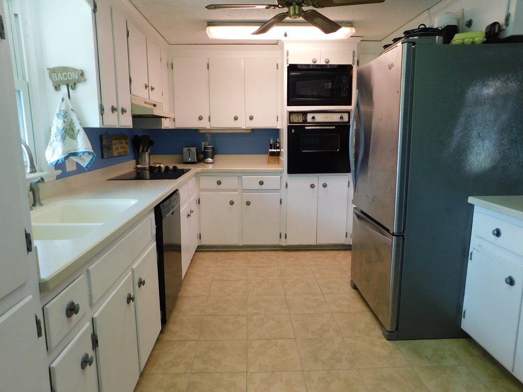 153 Joe Morris Road Kenly, NC 27542 - Photo 13 of 31 Large Kitchen with tons of Cabinets