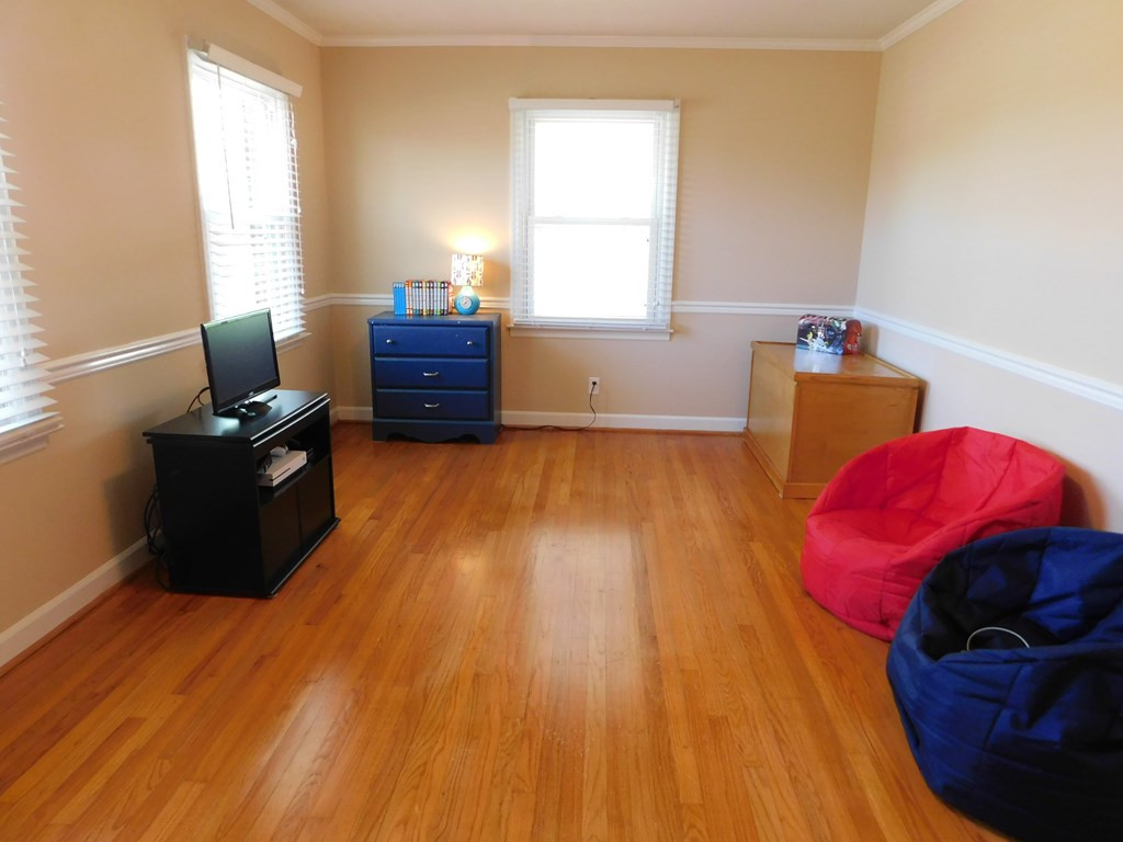 153 Joe Morris Road Kenly, NC 27542 - Photo 17 of 31 Living Room with Hardwood Flooring
