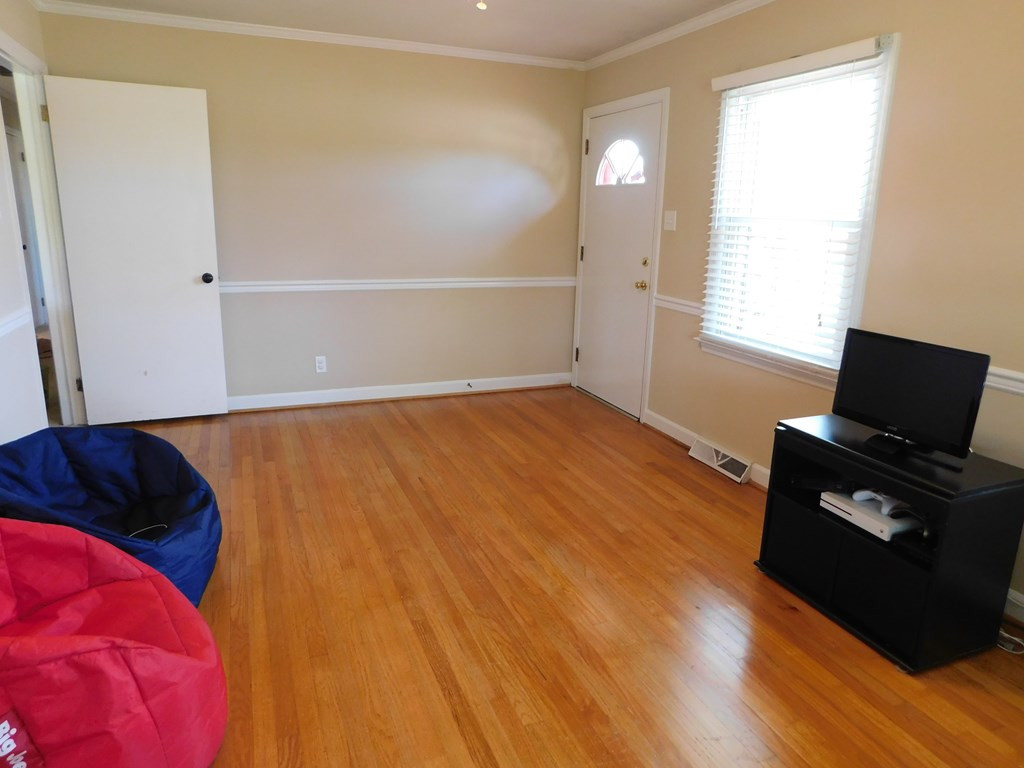153 Joe Morris Road Kenly, NC 27542 - Photo 18 of 31 Living Room with Hardwood Flooring