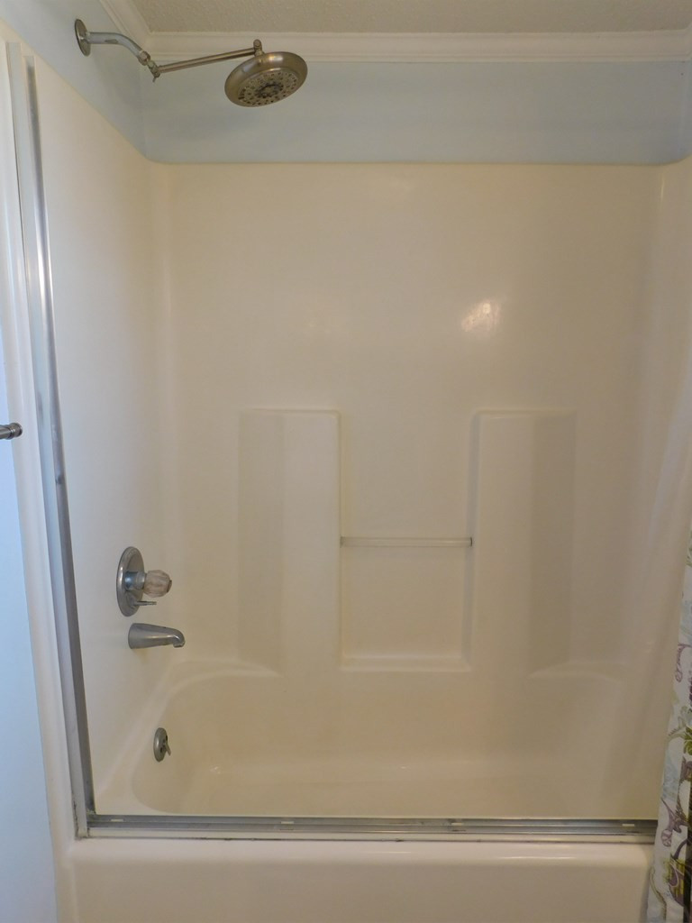 153 Joe Morris Road Kenly, NC 27542 - Photo 24 of 31 Master Tub/Shower