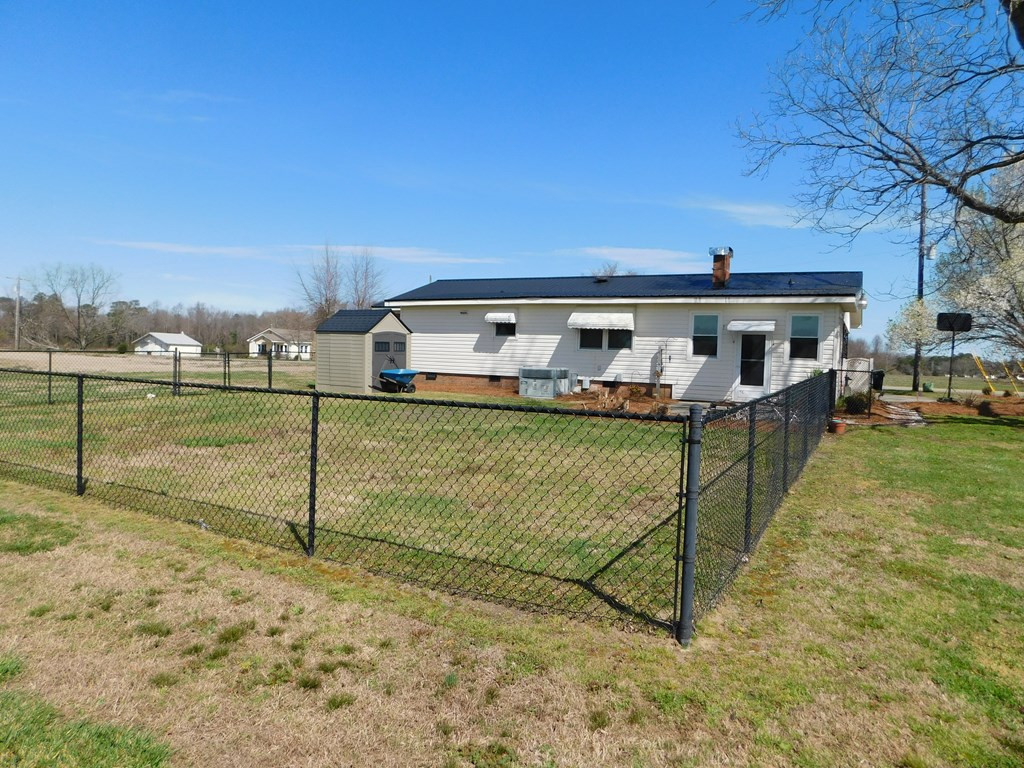 153 Joe Morris Road Kenly, NC 27542 - Photo 5 of 31 Back Yard View of Home