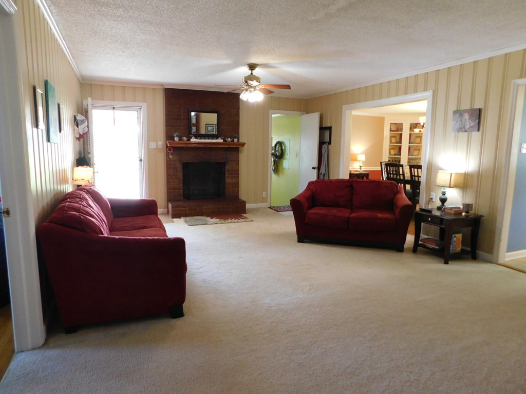 153 Joe Morris Road Kenly, NC 27542 - Photo 10 of 31 Family Room features a Fireplace