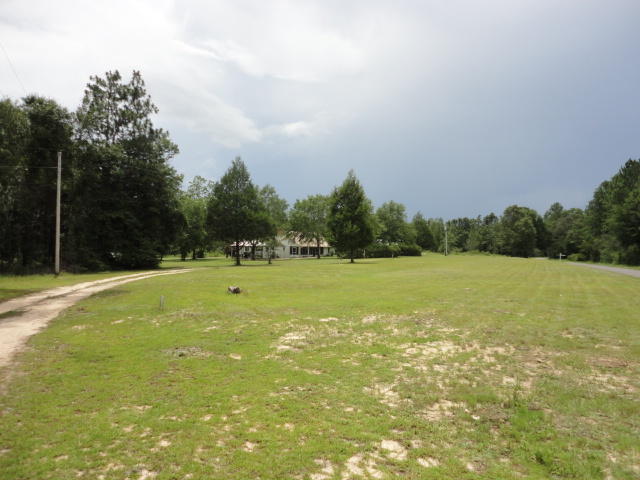 6404 Old River Road Baker, FL 32531 - Photo 2 of 28 a view of a lake view with a big yard
