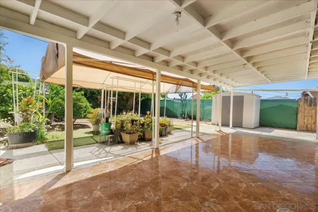 a view of a hall with a patio