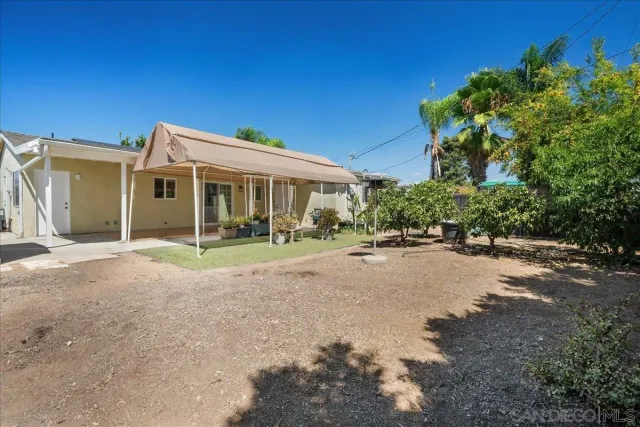a view of swimming pool with a patio
