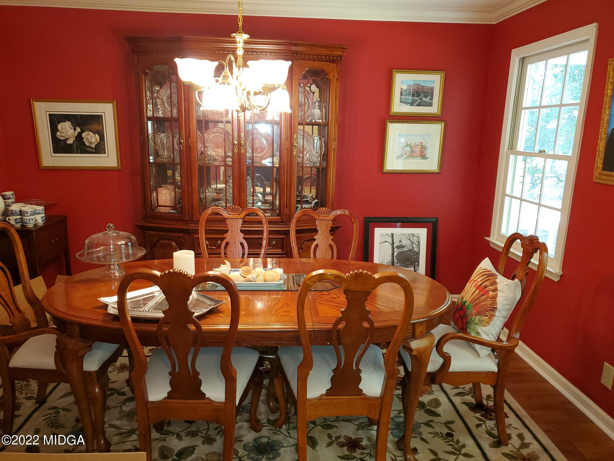 7952 Whittle Road Macon, GA 31220 - Photo 6 of 20 a view of a dining room with furniture and chandelier