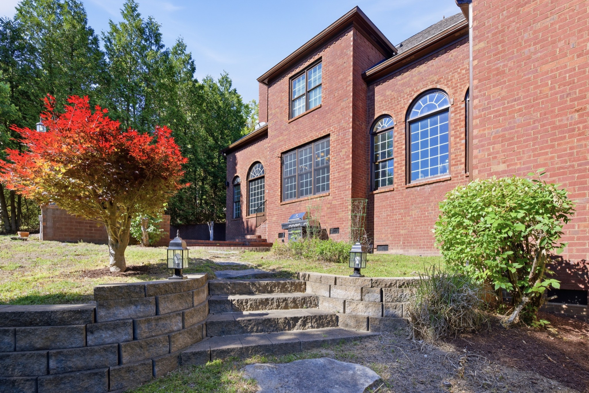 319 Hamlets End Way Franklin, TN 37067 - Photo 51 of 54 a front view of a house with garden
