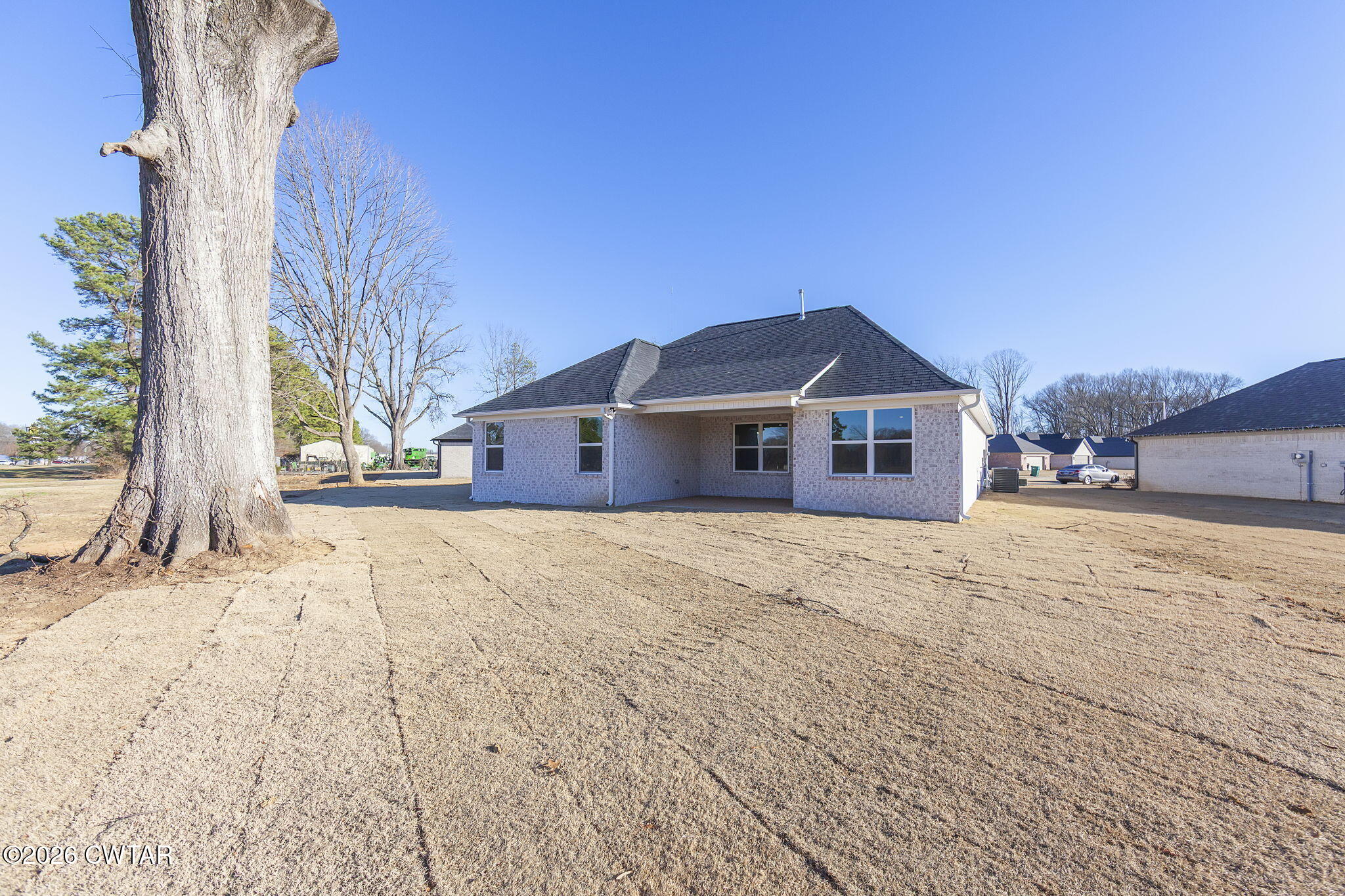 77 Grande Pnes Cove Jackson, TN 38305 - Photo 24 of 31 a view of a house with snow on the road