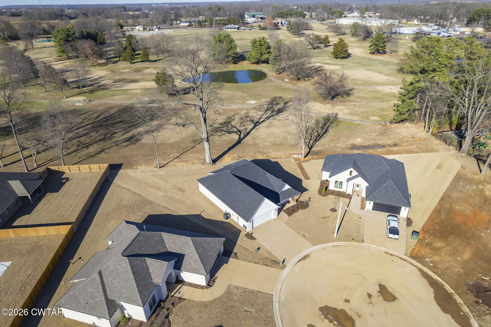 77 Grande Pnes Cove Jackson, TN 38305 - Photo 27 of 31 an aerial view of a house with a yard