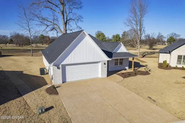 a view of a house with a patio