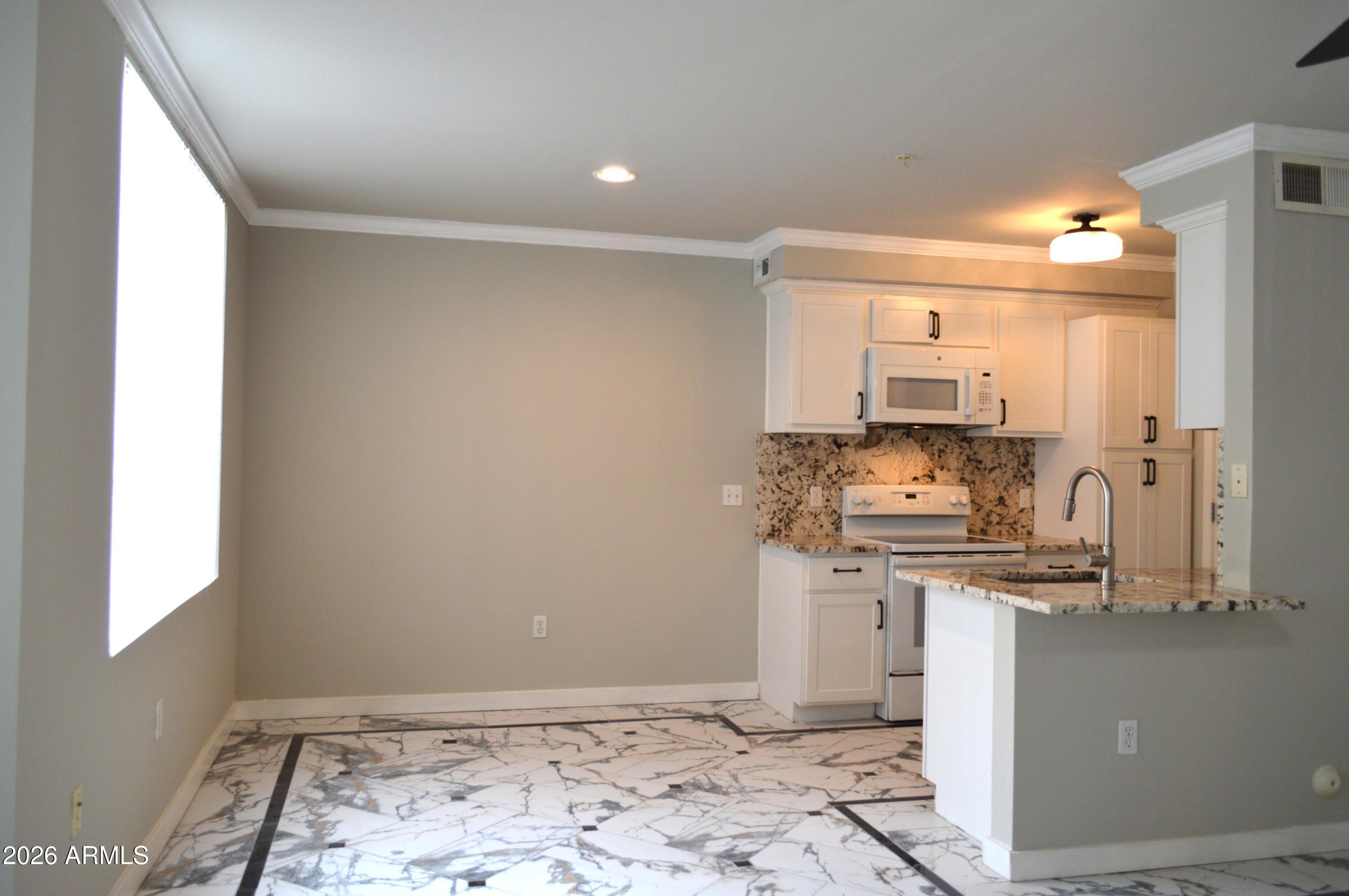 1701 East Colter Street, Unit 4 Phoenix, AZ 85016 - Photo 5 of 68 DSC_0007